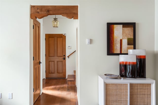 hallway featuring hardwood / wood-style flooring