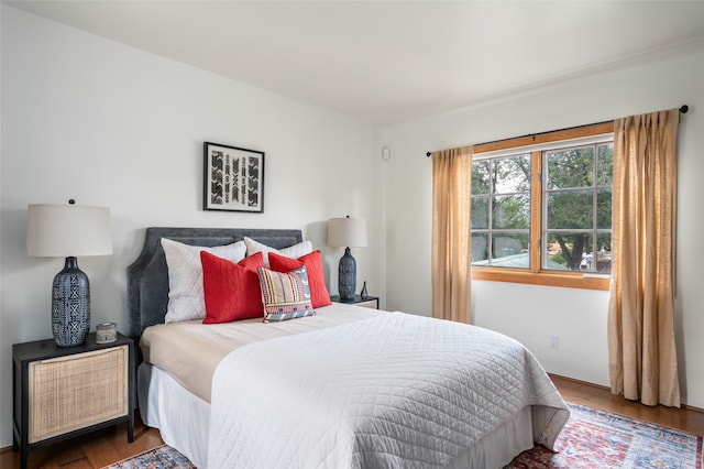 bedroom featuring hardwood / wood-style floors