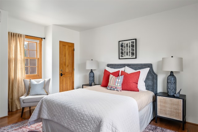 bedroom featuring dark wood-type flooring