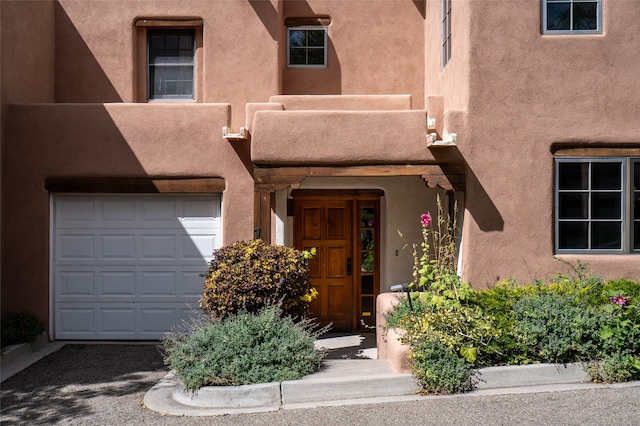 property entrance with a garage