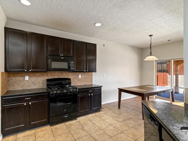 kitchen with black appliances, pendant lighting, dark brown cabinets, and backsplash