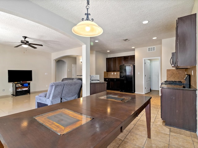 dining area with visible vents, recessed lighting, arched walkways, light tile patterned floors, and ceiling fan