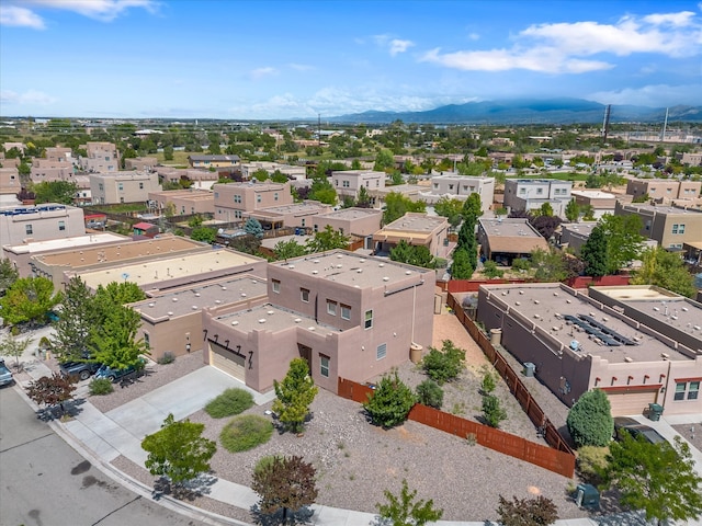 drone / aerial view featuring a mountain view