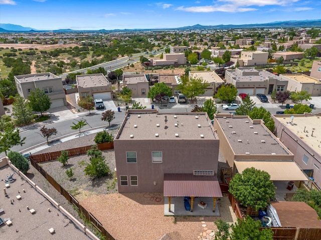 bird's eye view featuring a residential view and a mountain view