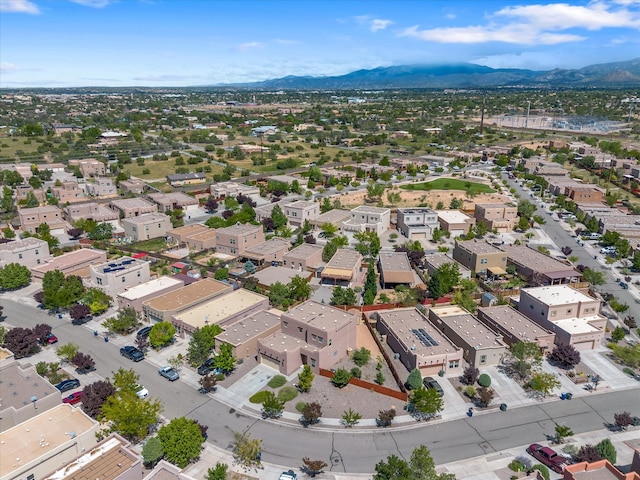 drone / aerial view featuring a mountain view and a residential view