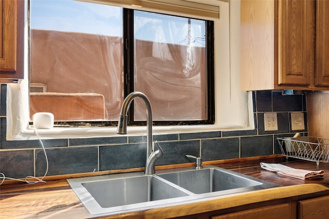 kitchen with hardwood / wood-style floors and sink