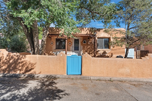 view of pueblo revival-style home