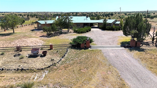 birds eye view of property featuring a rural view