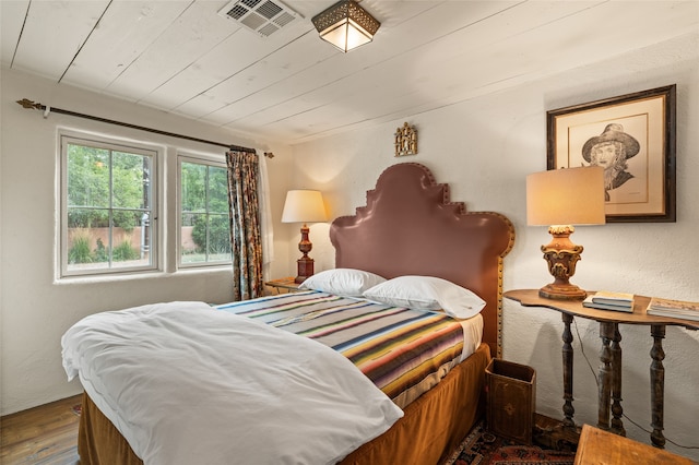 bedroom featuring hardwood / wood-style floors