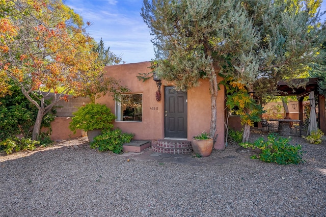 view of front of home featuring a patio