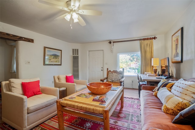 living room with ceiling fan