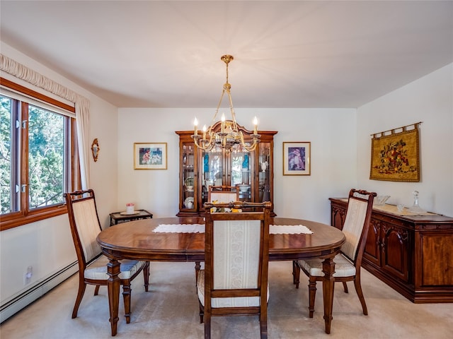 2176 La Tierra, Los Alamos, NM 87544 - dining area featuring light colored carpet, a notable chandelier, and a baseboard heating unit
