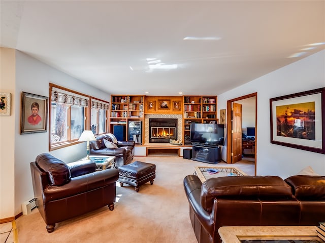 carpeted living room featuring built in shelves and baseboard heating