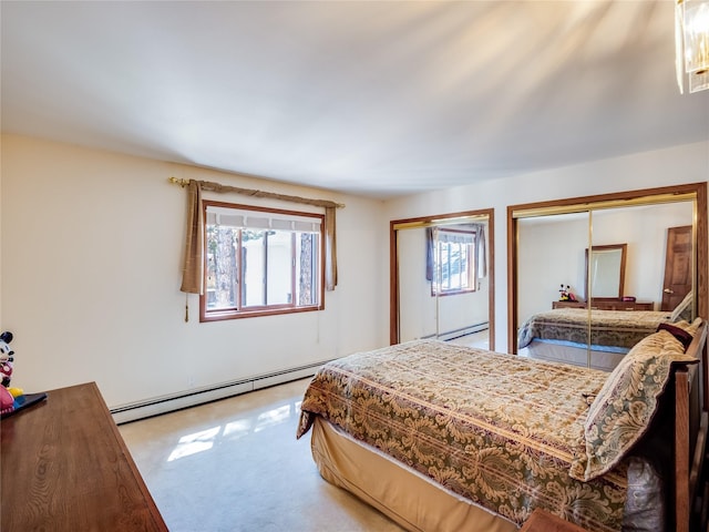 2176 La Tierra, Los Alamos, NM 87544 - bedroom with a baseboard heating unit, light colored carpet, a baseboard radiator, and multiple closets