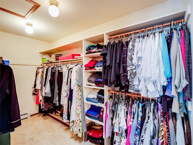 2176 La Tierra, Los Alamos, NM 87544 - walk in closet featuring a baseboard radiator, attic access, and carpet floors