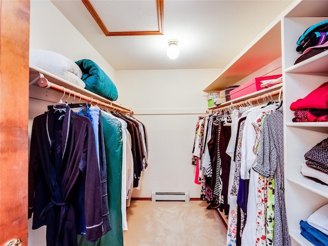 2176 La Tierra, Los Alamos, NM 87544 - walk in closet featuring a baseboard radiator, attic access, and carpet floors