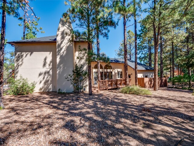 2176 La Tierra, Los Alamos, NM 87544 - exterior space featuring stucco siding and a wooden deck