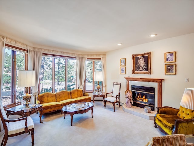 2176 La Tierra, Los Alamos, NM 87544 - carpeted living area featuring a tile fireplace, recessed lighting, and a wealth of natural light