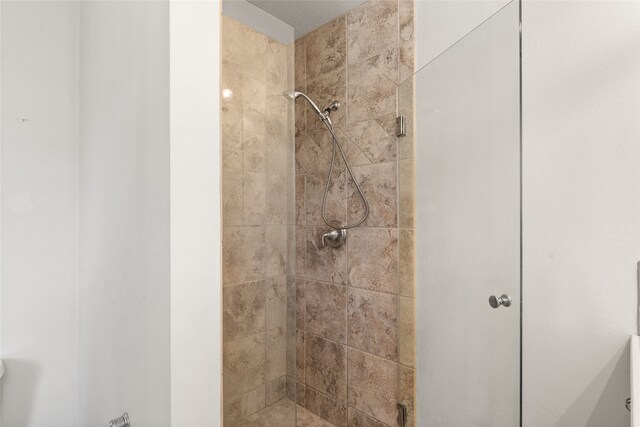 bathroom featuring an enclosed shower