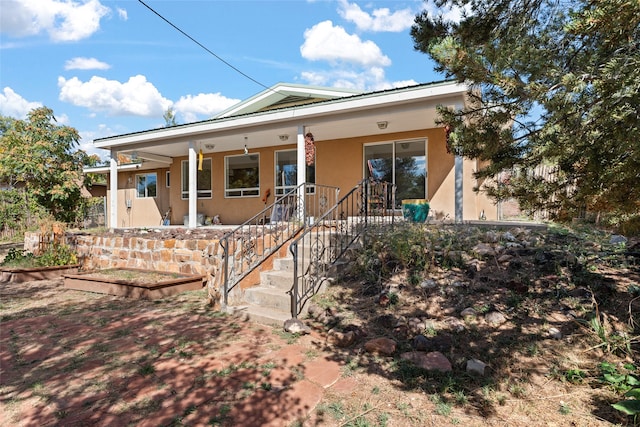 view of front of house with covered porch