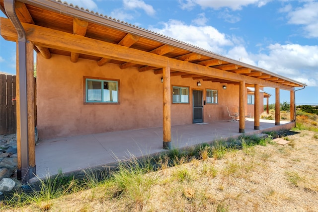 back of house featuring a patio area