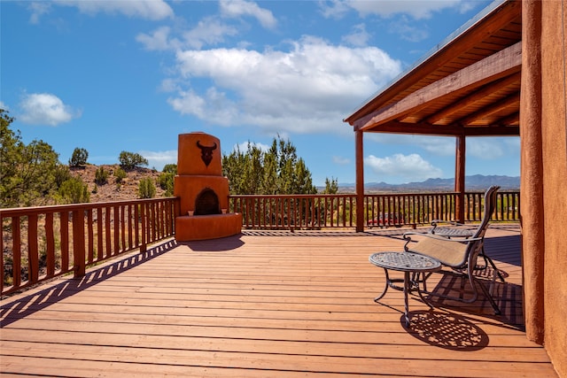 wooden terrace with a mountain view