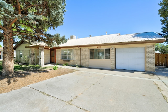 single story home with a garage