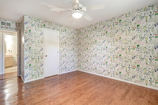 unfurnished room featuring wood-type flooring and ceiling fan