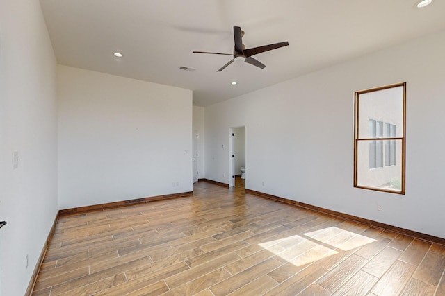 unfurnished room with ceiling fan