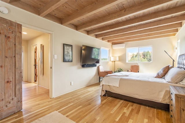 bedroom with beamed ceiling, a wall mounted air conditioner, wood ceiling, and light wood-type flooring