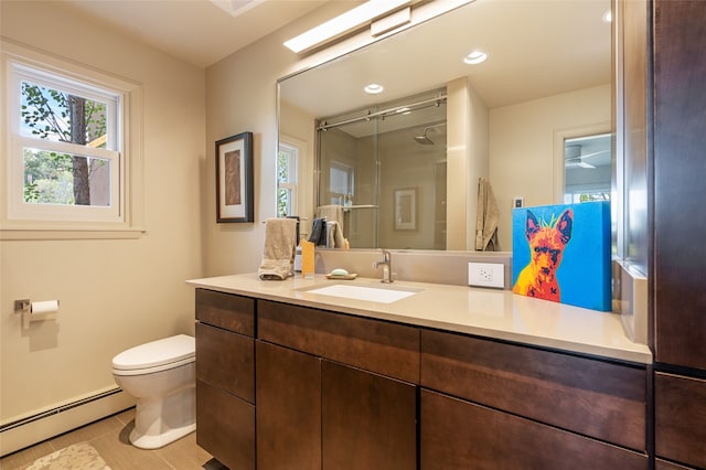 bathroom featuring baseboard heating, tile patterned flooring, toilet, vanity, and a shower with shower door