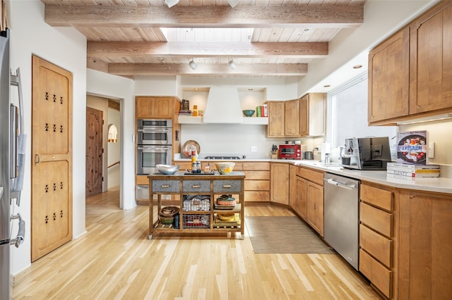 kitchen with appliances with stainless steel finishes, beam ceiling, and wood ceiling