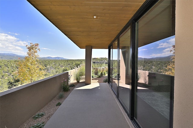 balcony featuring a mountain view