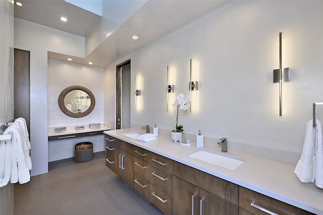 bathroom featuring tile patterned floors and vanity