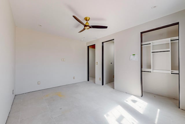 unfurnished bedroom featuring ceiling fan