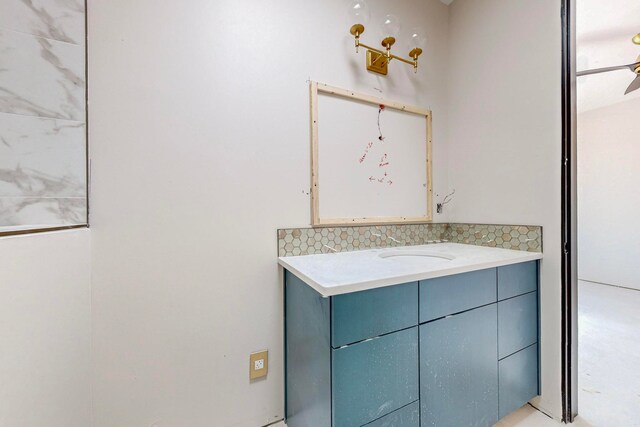 bathroom featuring backsplash and vanity