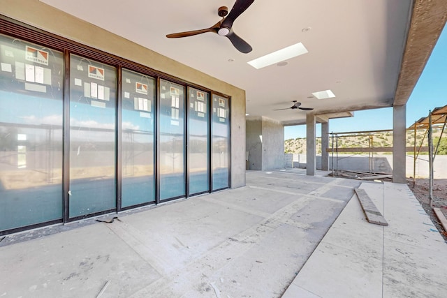 view of patio featuring ceiling fan