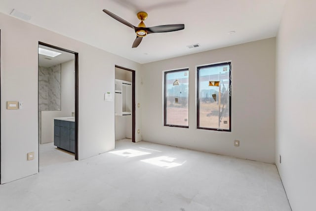 unfurnished bedroom featuring ceiling fan