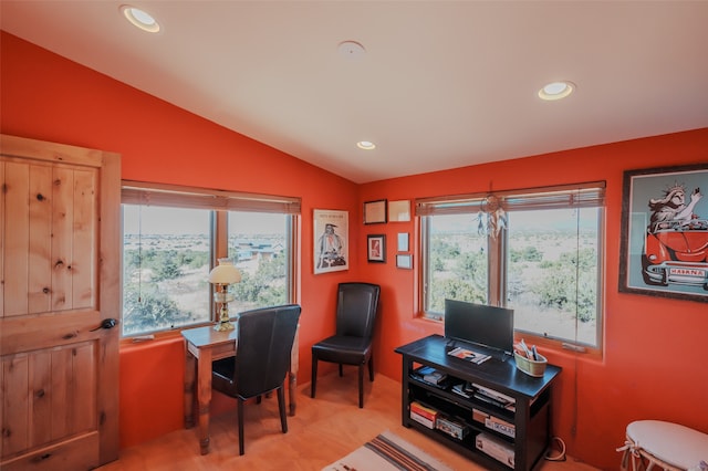 office space featuring a wealth of natural light and vaulted ceiling