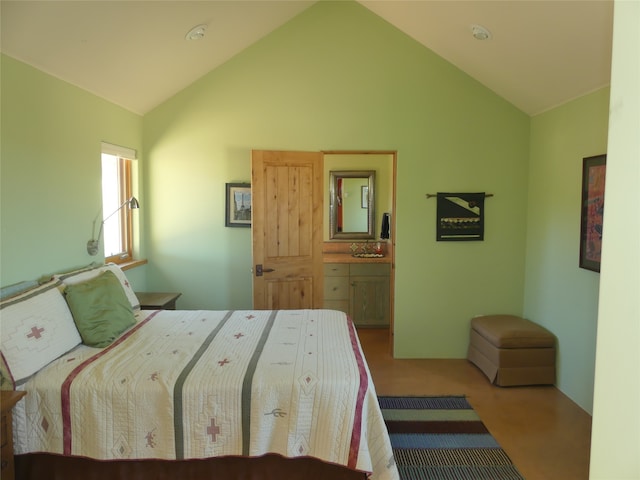 bedroom with lofted ceiling