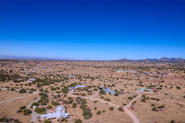 bird's eye view with a mountain view