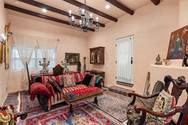 living room featuring a chandelier and beam ceiling