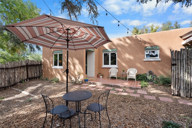 back of house with a patio area