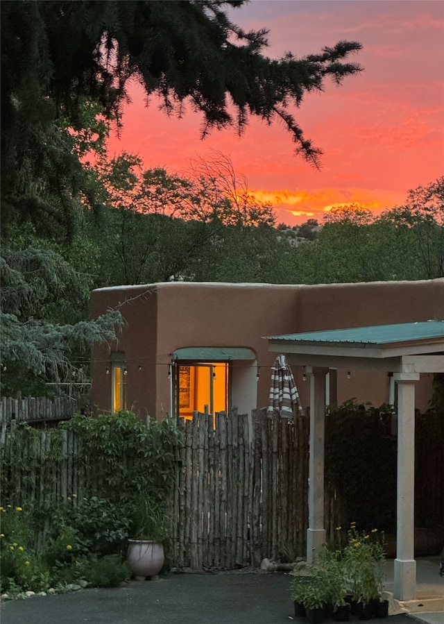 view of property exterior at dusk