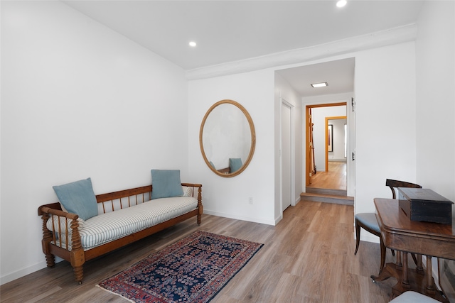 living area with light hardwood / wood-style flooring