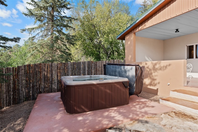 view of patio featuring a hot tub