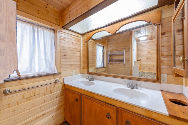 bathroom with wood walls and vanity