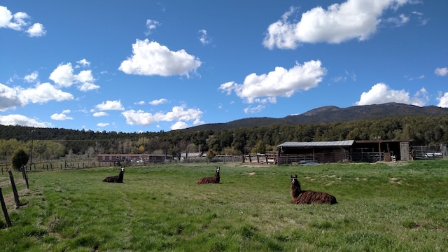 property view of mountains featuring a rural view