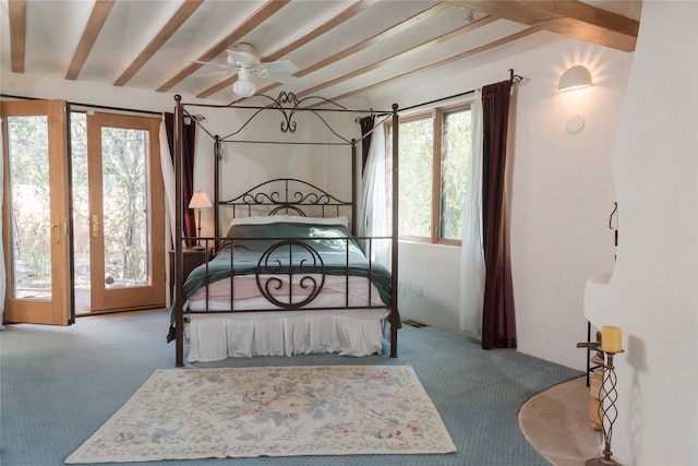 carpeted bedroom with ceiling fan, beamed ceiling, and access to exterior