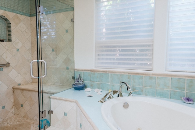 bathroom with independent shower and bath